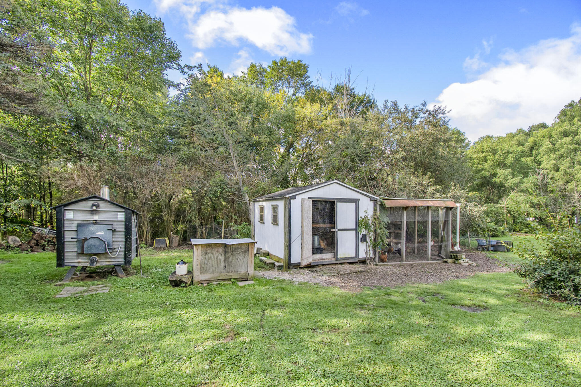 3986 Haynes Road Stockbridge, MI 49285 - Photo 24 of 35 Chicken Coop - Wood Burner