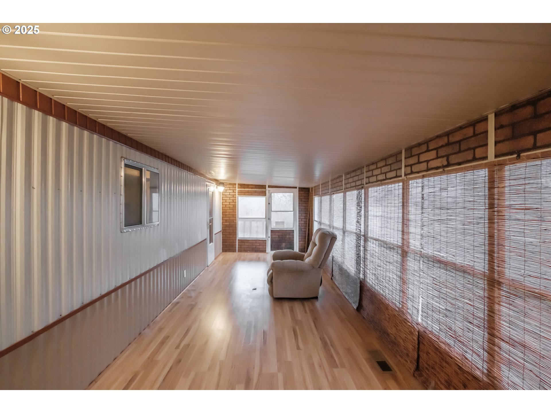 3760 Highway 101, Unit 7A Florence, OR 97439 - Photo 16 of 34 a very nice looking room with wooden floor