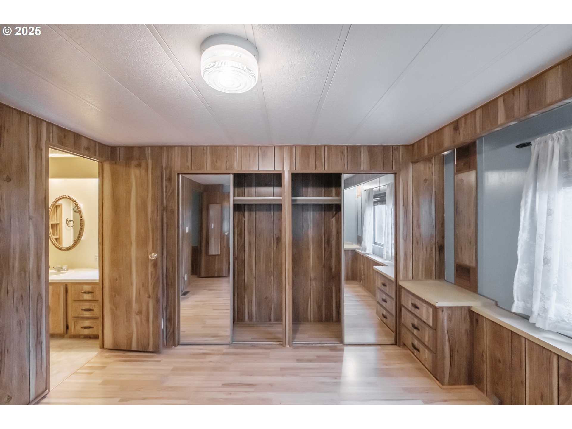 3760 Highway 101, Unit 7A Florence, OR 97439 - Photo 26 of 34 a view of a hallway with wooden floor