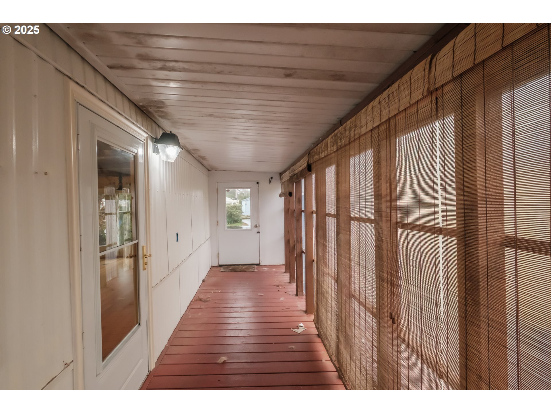 3760 Highway 101, Unit 7A Florence, OR 97439 - Photo 33 of 34 a view of hallway with wooden floor