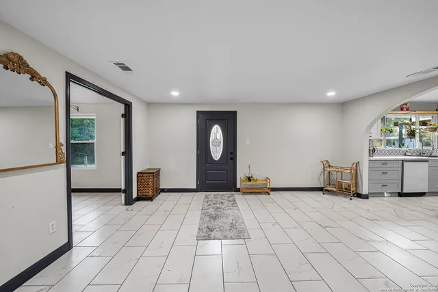 a view of a livingroom with a furniture