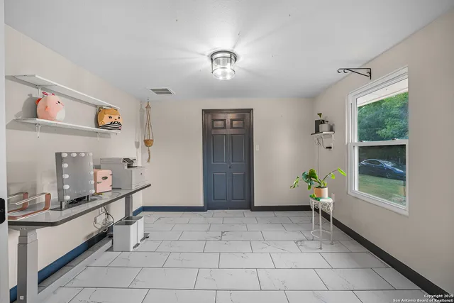 a view of an entryway with a window