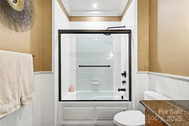 a bathroom with a shower and a sink