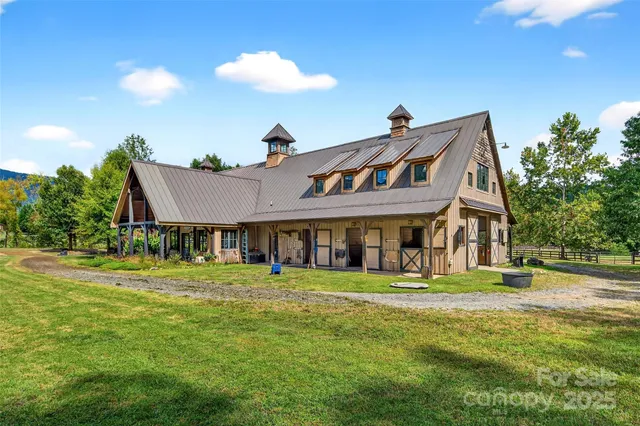 a view of a garage with a white building