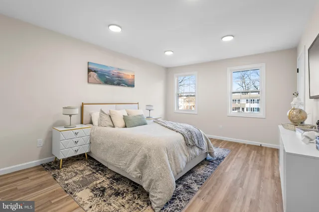 a bed room with a bed and a window