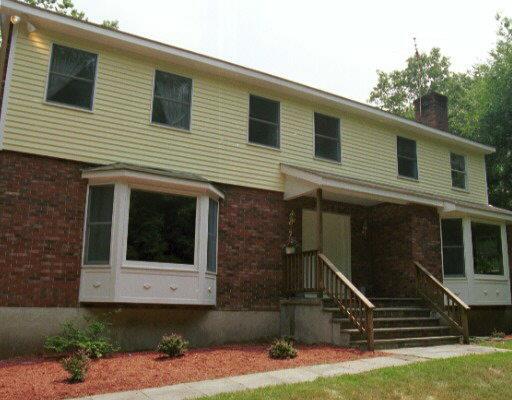188 Brookdale Road Stamford, CT 06903 - Photo 1 of 1 a front view of a house with garage