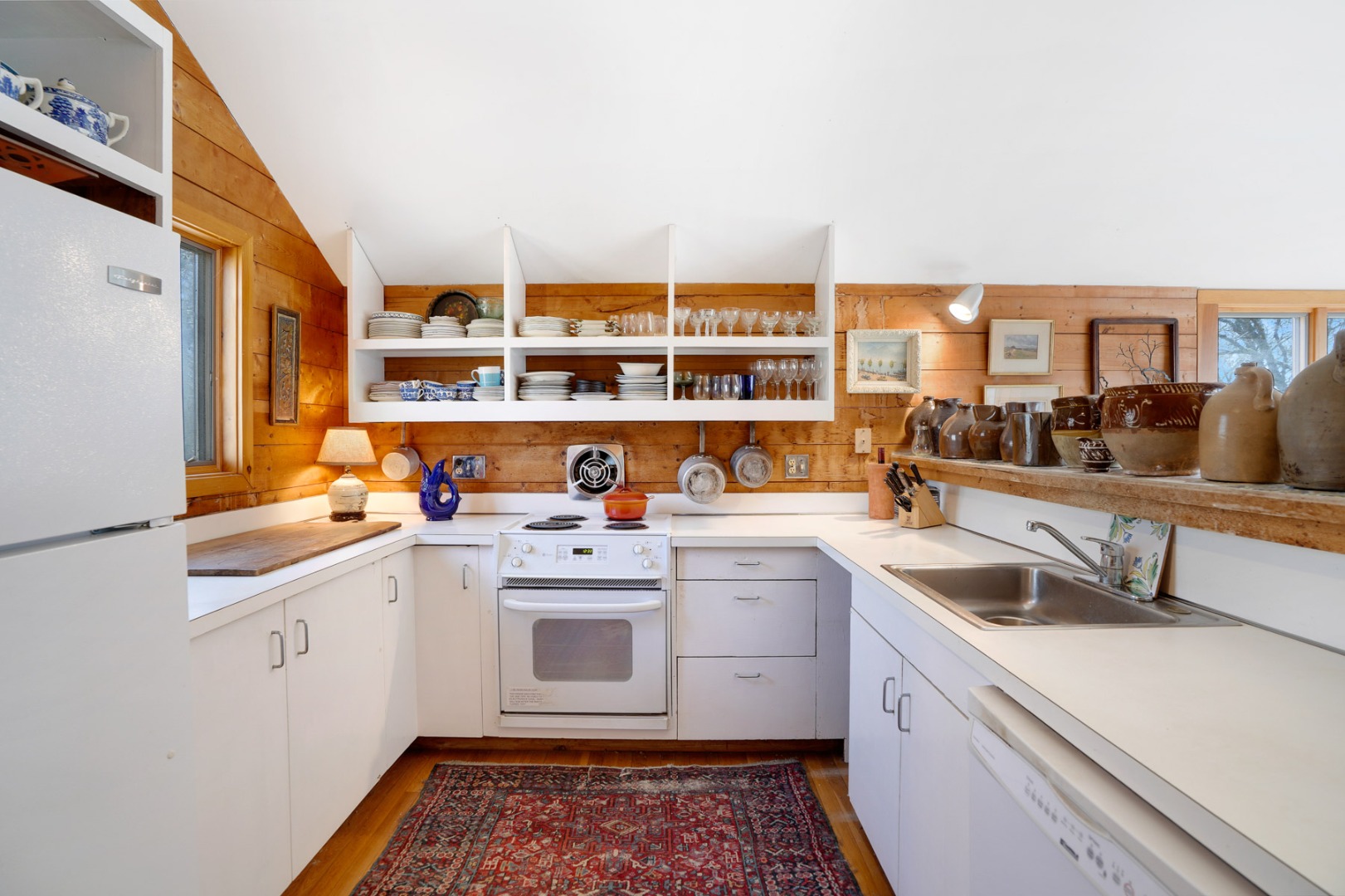25 Fulling Mill Road Chilmark, MA 02535 - Photo 11 of 31 a kitchen with a sink and a stove top oven
