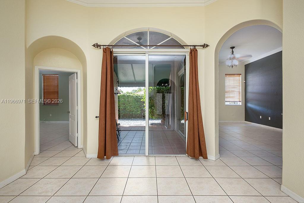 3436 Southwest 152nd Pass Miami, FL 33185 - Photo 13 of 36 a view of entryway and hallway with a glass door