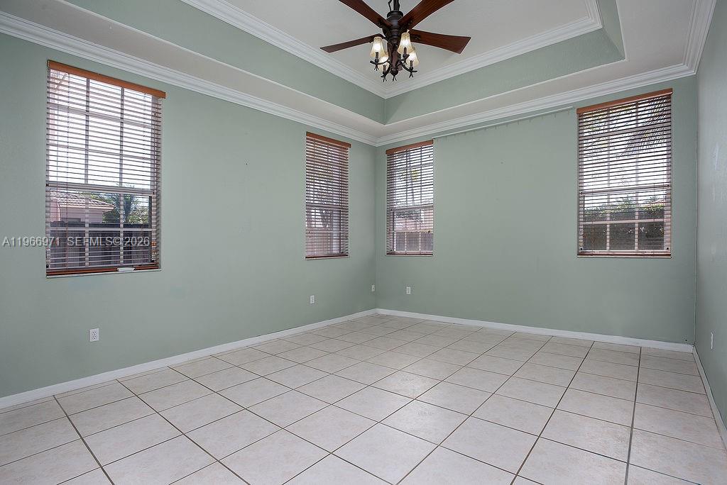 3436 Southwest 152nd Pass Miami, FL 33185 - Photo 14 of 36 a view of an empty room with a window