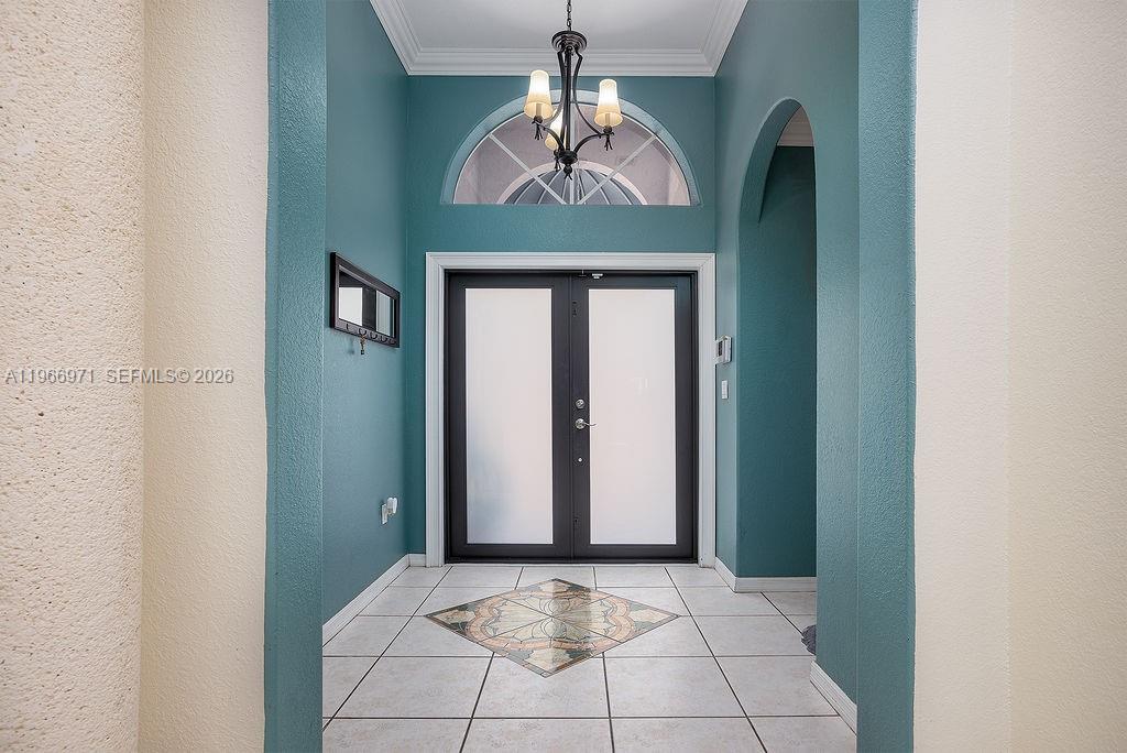 3436 Southwest 152nd Pass Miami, FL 33185 - Photo 2 of 36 a view of a hallway with windows