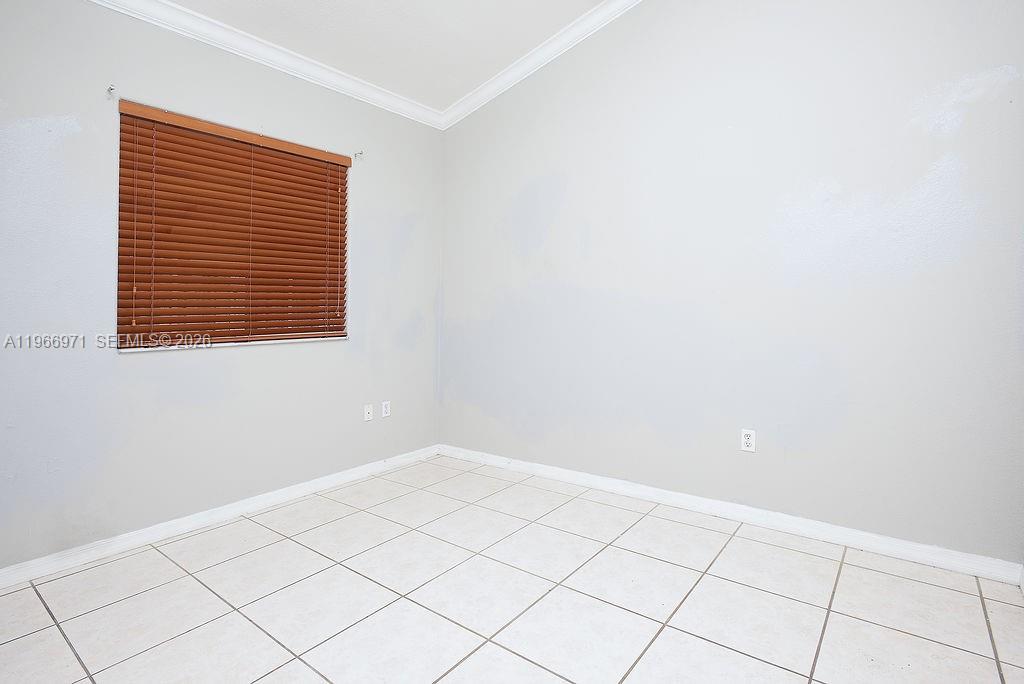 3436 Southwest 152nd Pass Miami, FL 33185 - Photo 23 of 36 a view of an empty room and window