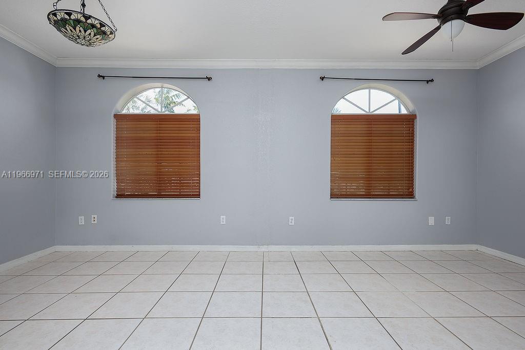3436 Southwest 152nd Pass Miami, FL 33185 - Photo 25 of 36 an empty room with windows