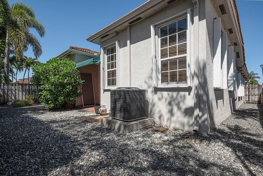 3436 Southwest 152nd Pass Miami, FL 33185 - Photo 29 of 36 a view of a house with a yard