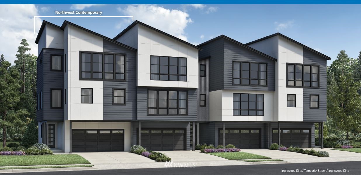 2419 217th Street Southeast, Unit A Bothell, WA 98021 - Photo 1 of 2 a front view of a house with a yard and balcony