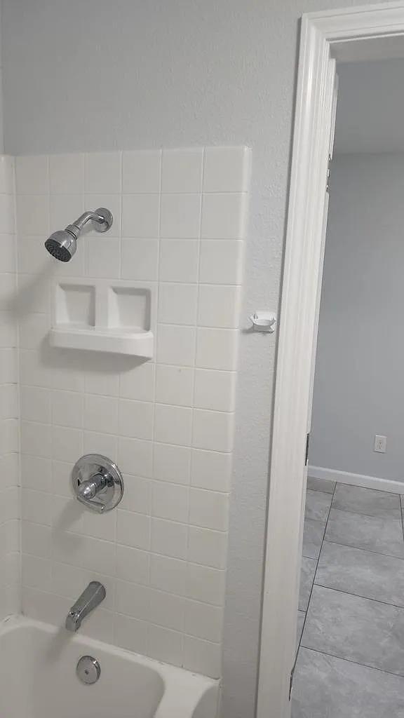 834 South Washington Street Lodi, CA 95240 - Photo 12 of 42 a bathroom with a bathtub