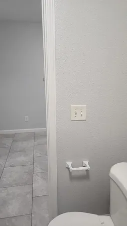 a bathroom with a toilet