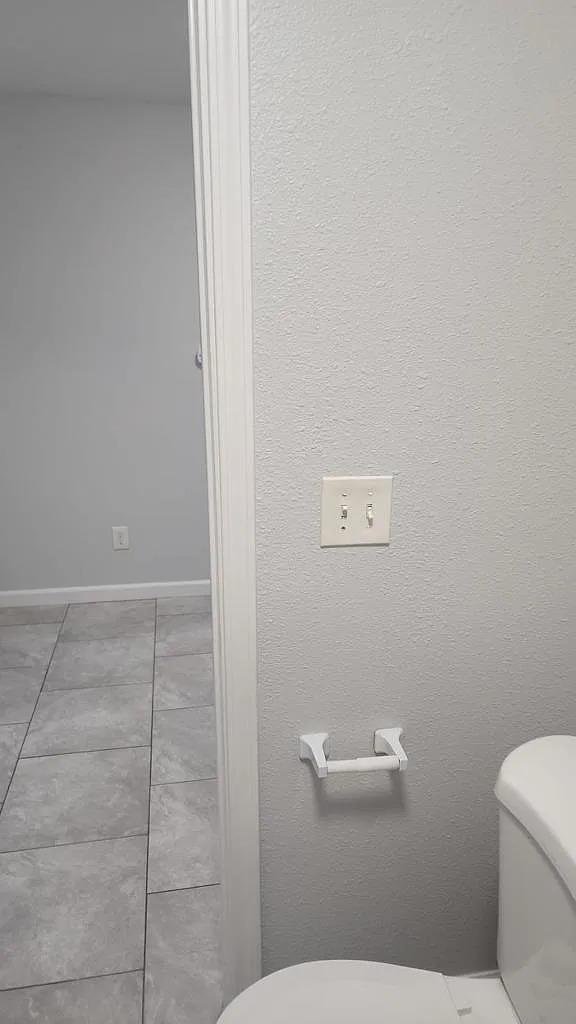 834 South Washington Street Lodi, CA 95240 - Photo 13 of 42 a bathroom with a toilet