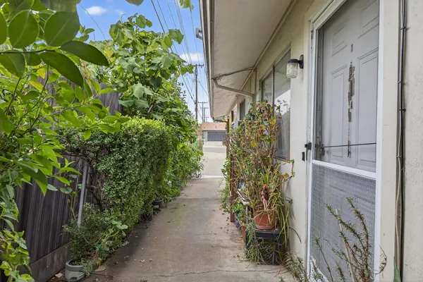 a view of a house with a street