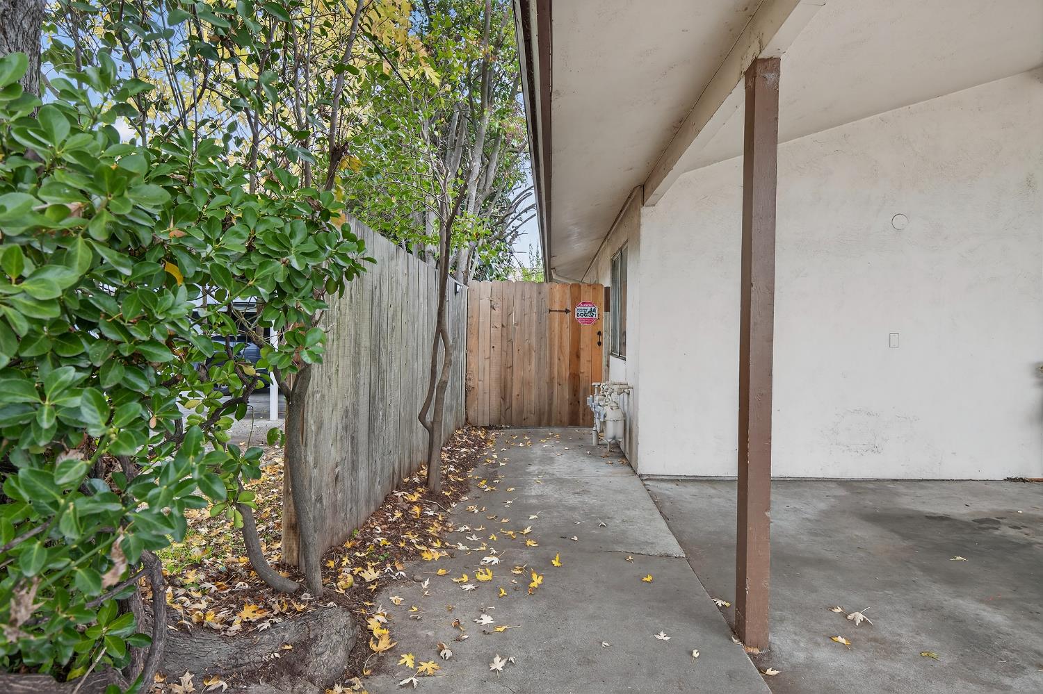 834 South Washington Street Lodi, CA 95240 - Photo 20 of 42 a view of a house with a backyard