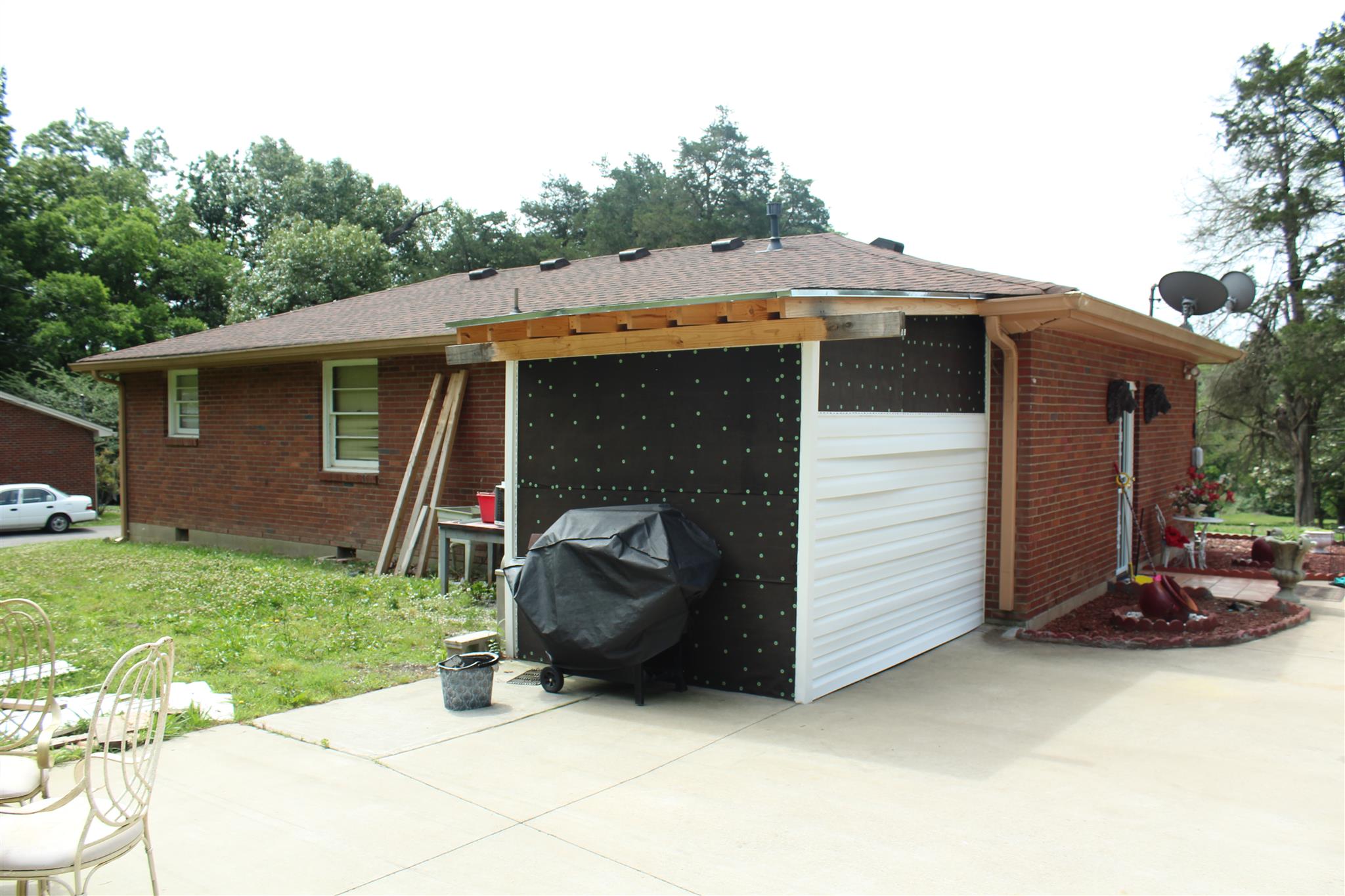 1049 Neelys Bend Road Madison, TN 37115 - Photo 4 of 12 Back of home. adding a large closet