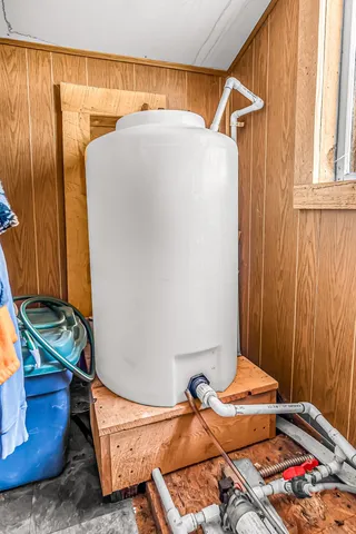 a view of balcony with wooden floor and fence
