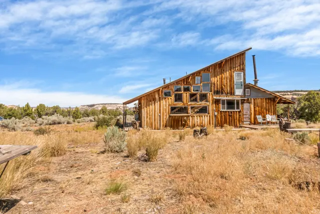 a view of a yard with large trees