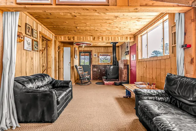 a living room with furniture and a couch