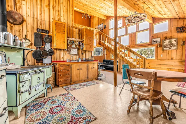 a view of a chairs and table in the patio