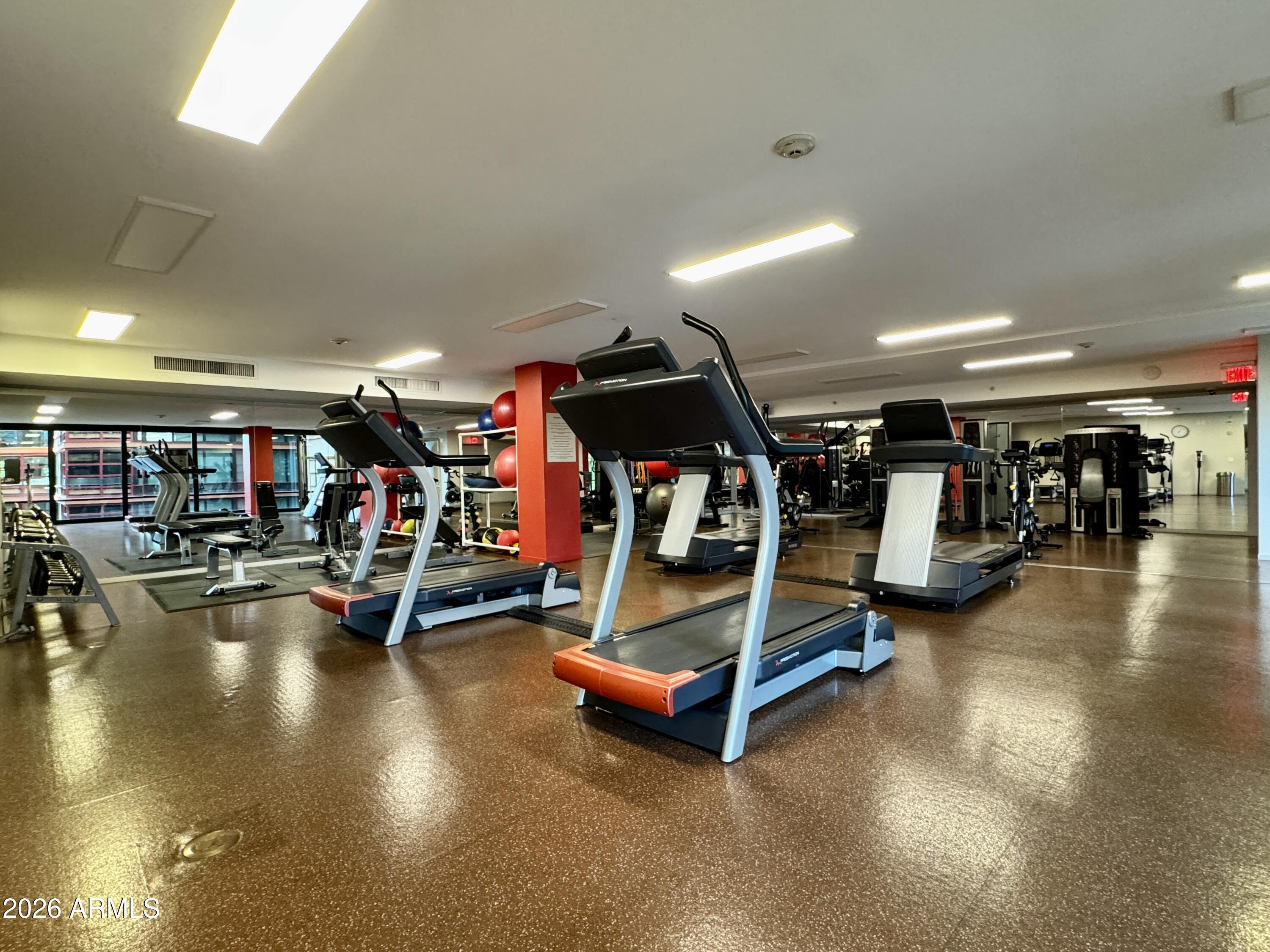 4808 North 24th Street, Unit 1102 Phoenix, AZ 85016 - Photo 13 of 20 a view of a room with gym equipment