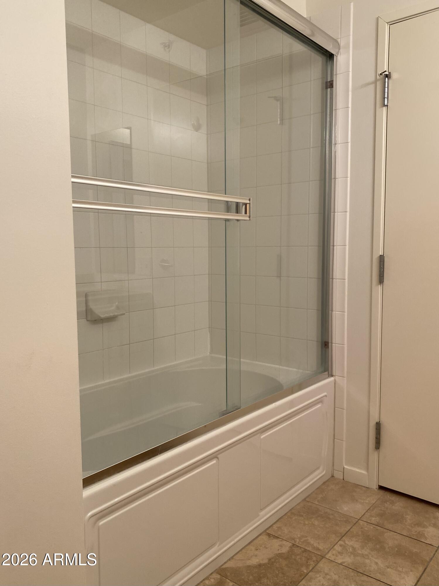 4808 North 24th Street, Unit 1102 Phoenix, AZ 85016 - Photo 9 of 20 a bathroom with a shower