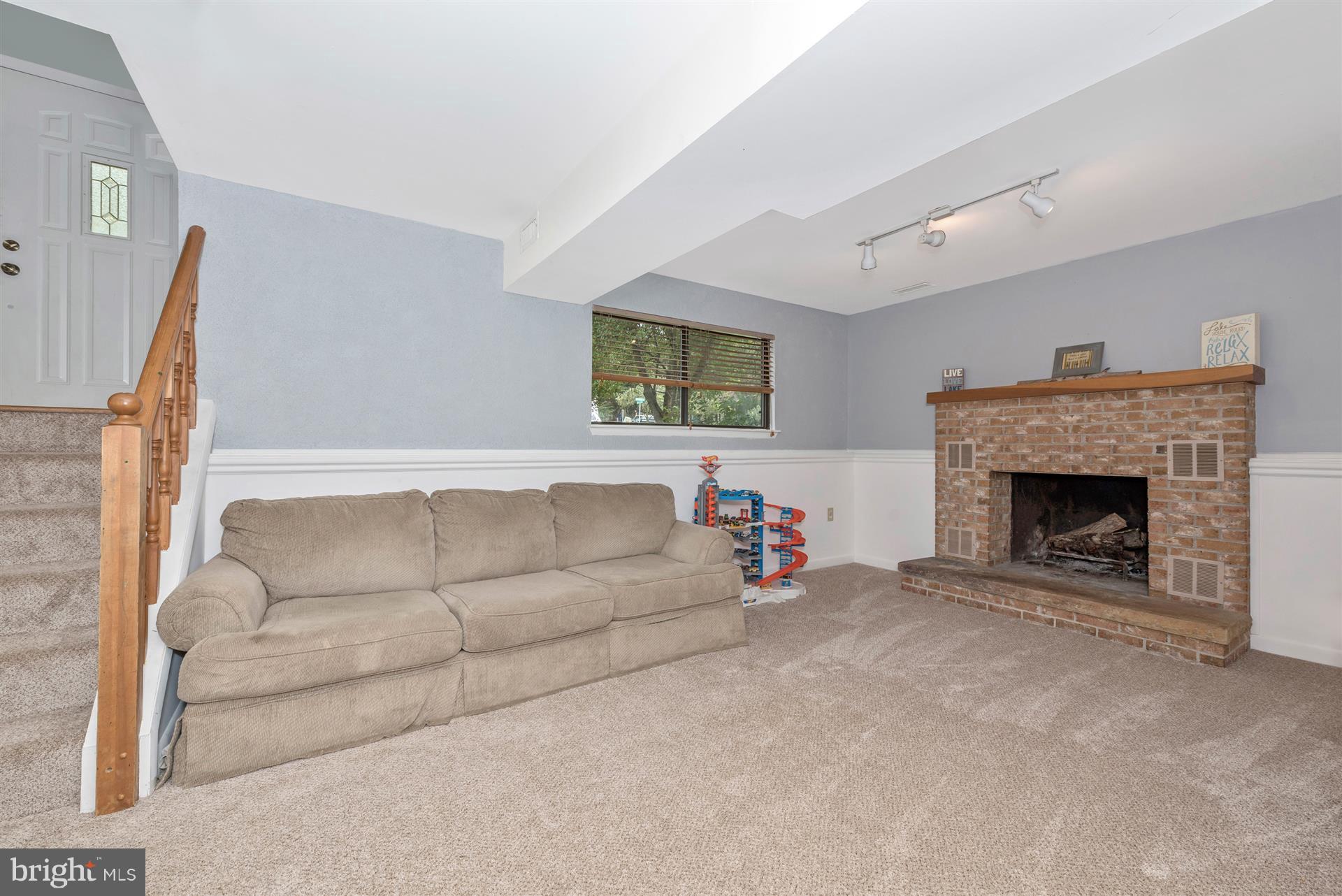 6908 Fox Chase Road New Market, MD 21774 - Photo 17 of 30 Finished Lower Level with Fireplace