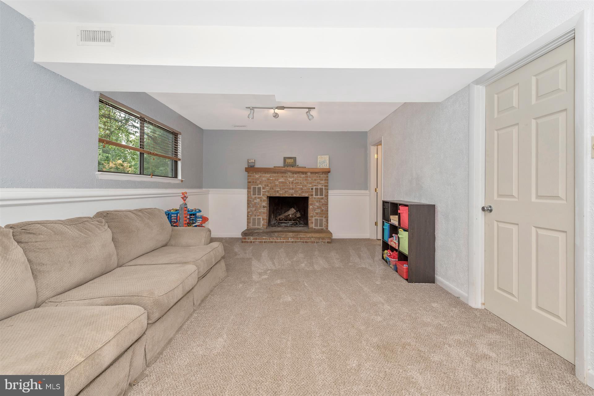 6908 Fox Chase Road New Market, MD 21774 - Photo 18 of 30 Finished Lower Level with Fireplace
