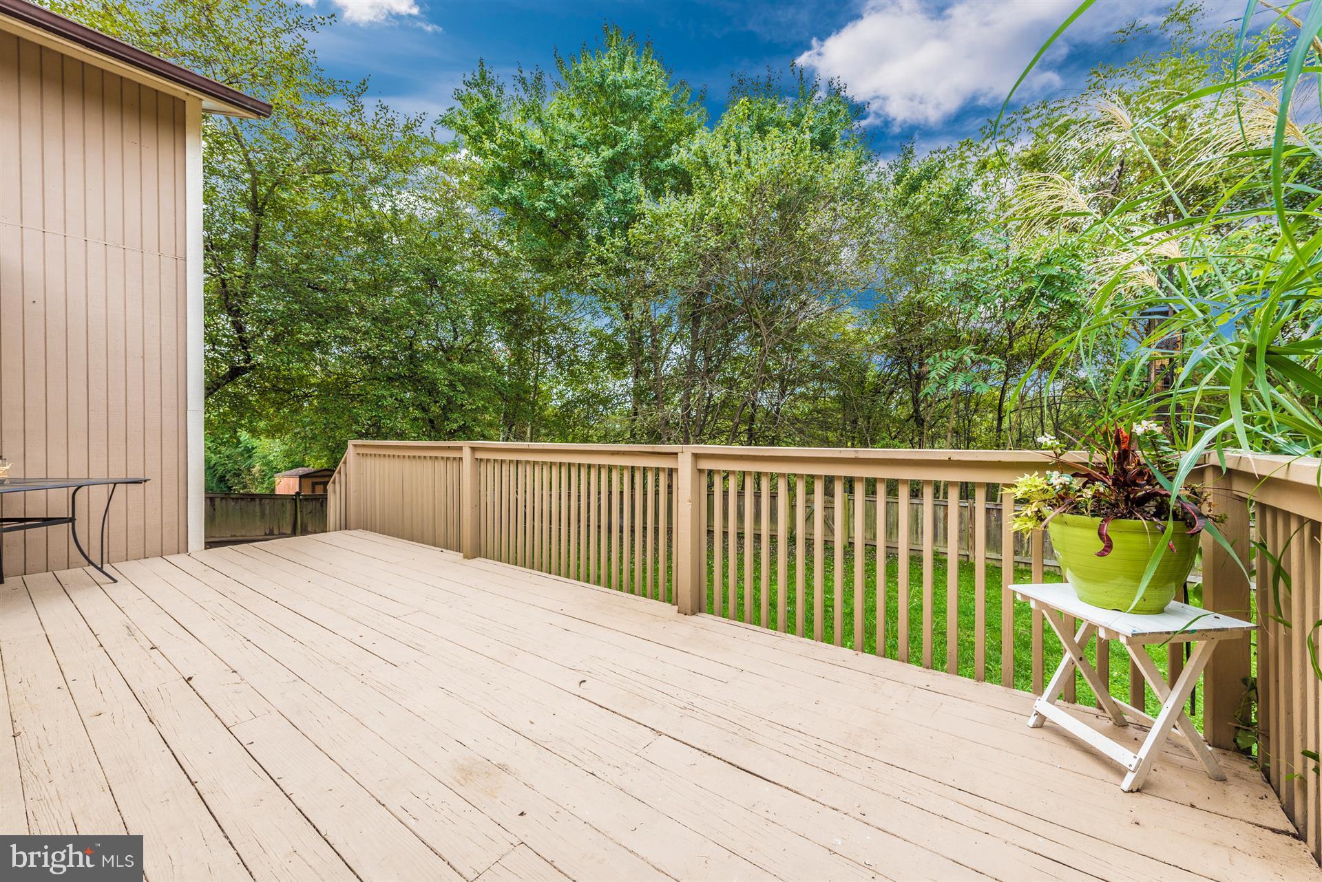 6908 Fox Chase Road New Market, MD 21774 - Photo 23 of 30 Back Deck Overlooking Yard and Trees
