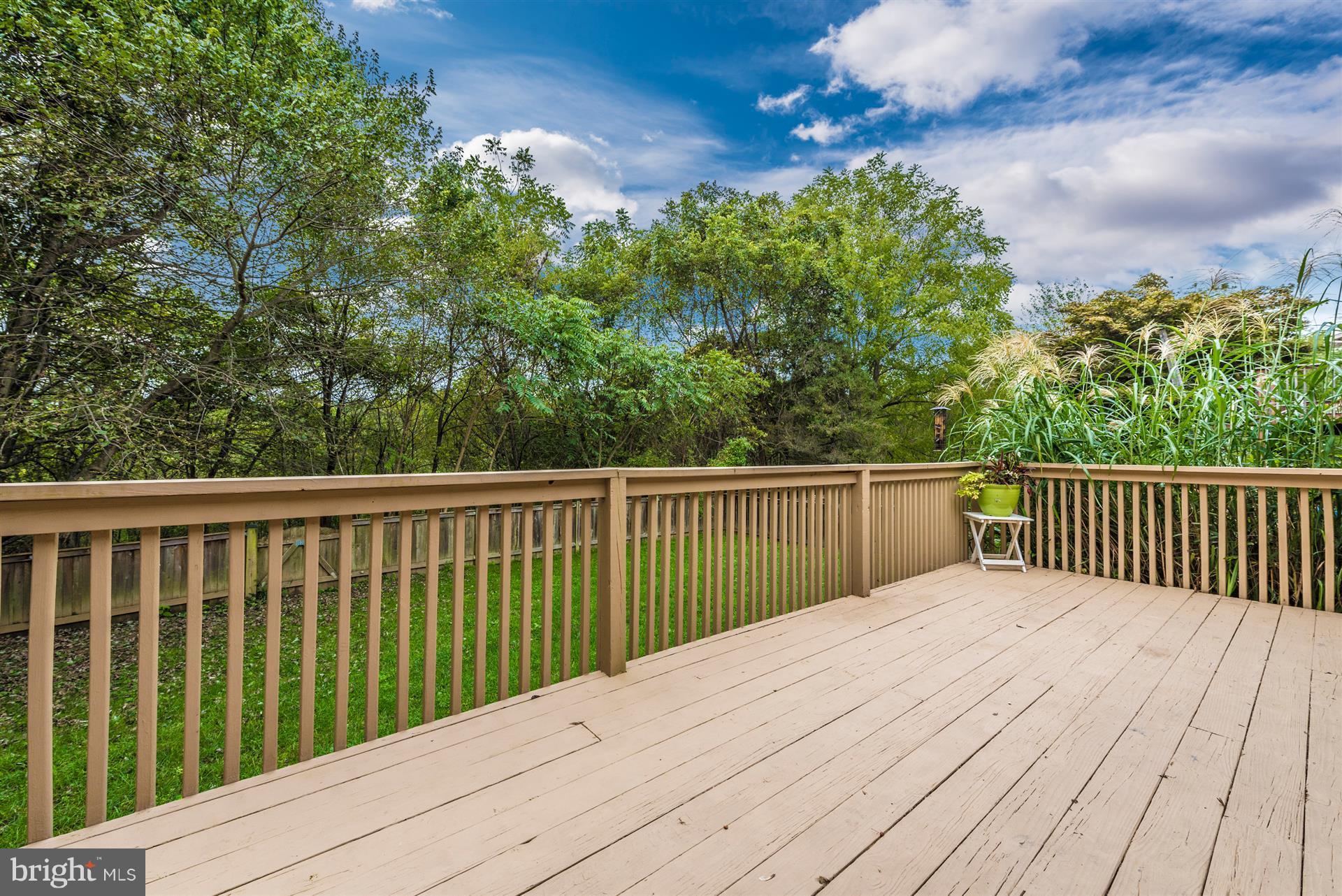 6908 Fox Chase Road New Market, MD 21774 - Photo 24 of 30 Back Deck Overlooking Yard and Trees
