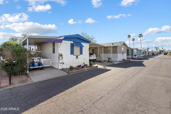 a view of a street with houses
