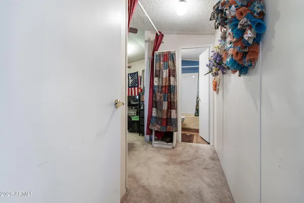 a view of a room with a wardrobe space