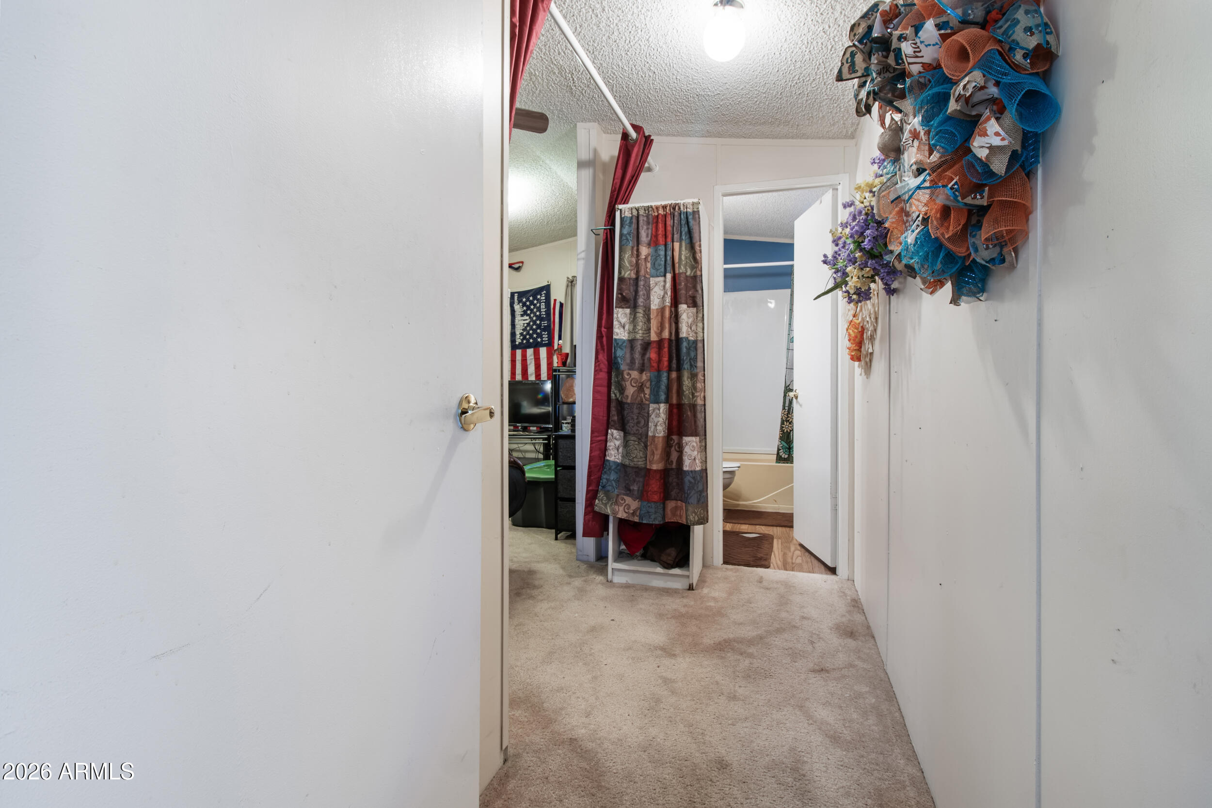 2121 North Center Street, Unit 15 Mesa, AZ 85201 - Photo 13 of 50 a view of a room with a wardrobe space