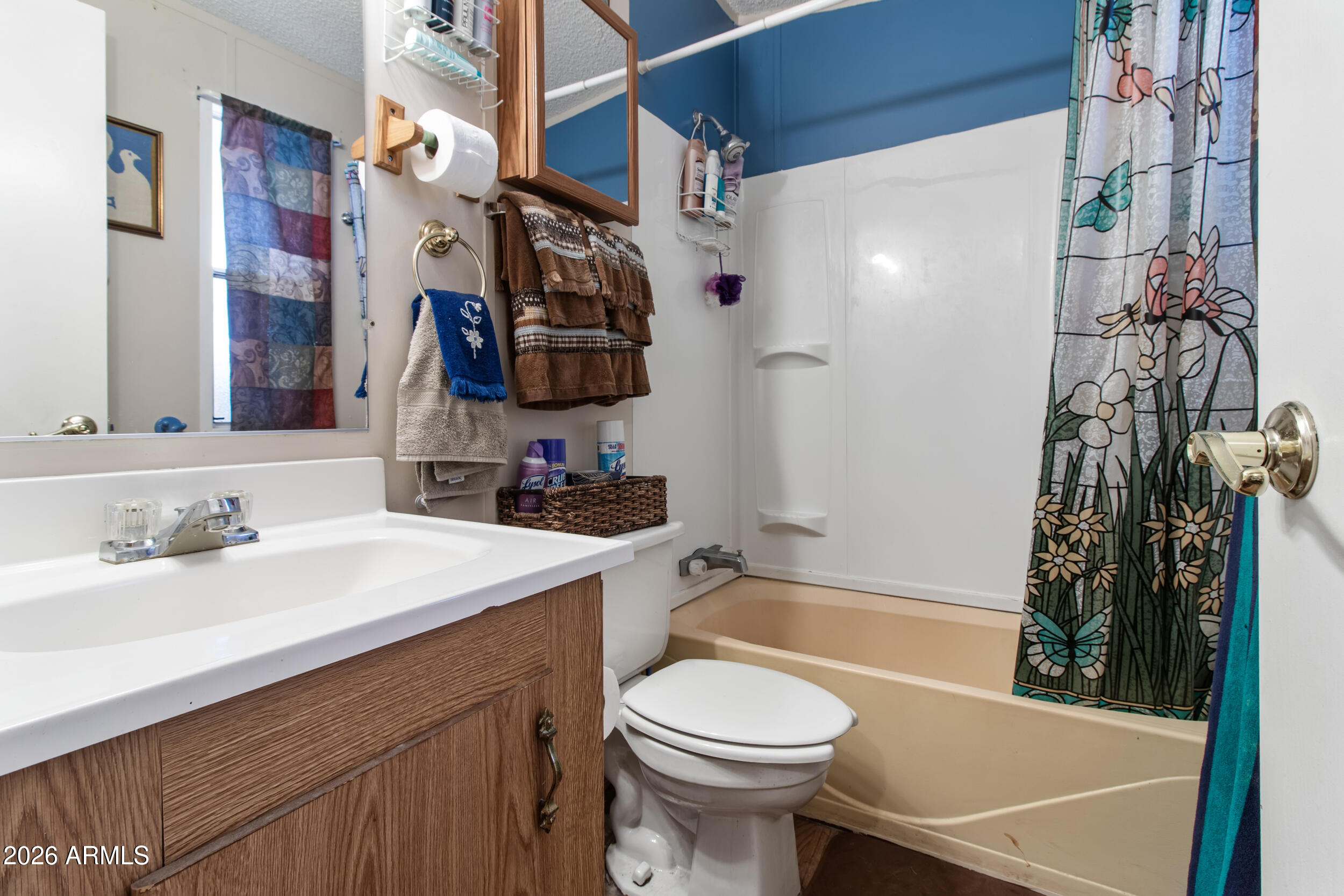 2121 North Center Street, Unit 15 Mesa, AZ 85201 - Photo 14 of 50 a bathroom with a sink a toilet and shower