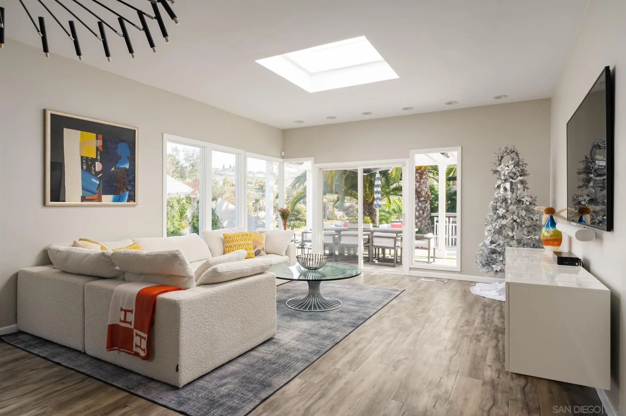 7026 Estrella De Mar Road Carlsbad, CA 92009 - Photo 17 of 46 a living room with furniture and a large window