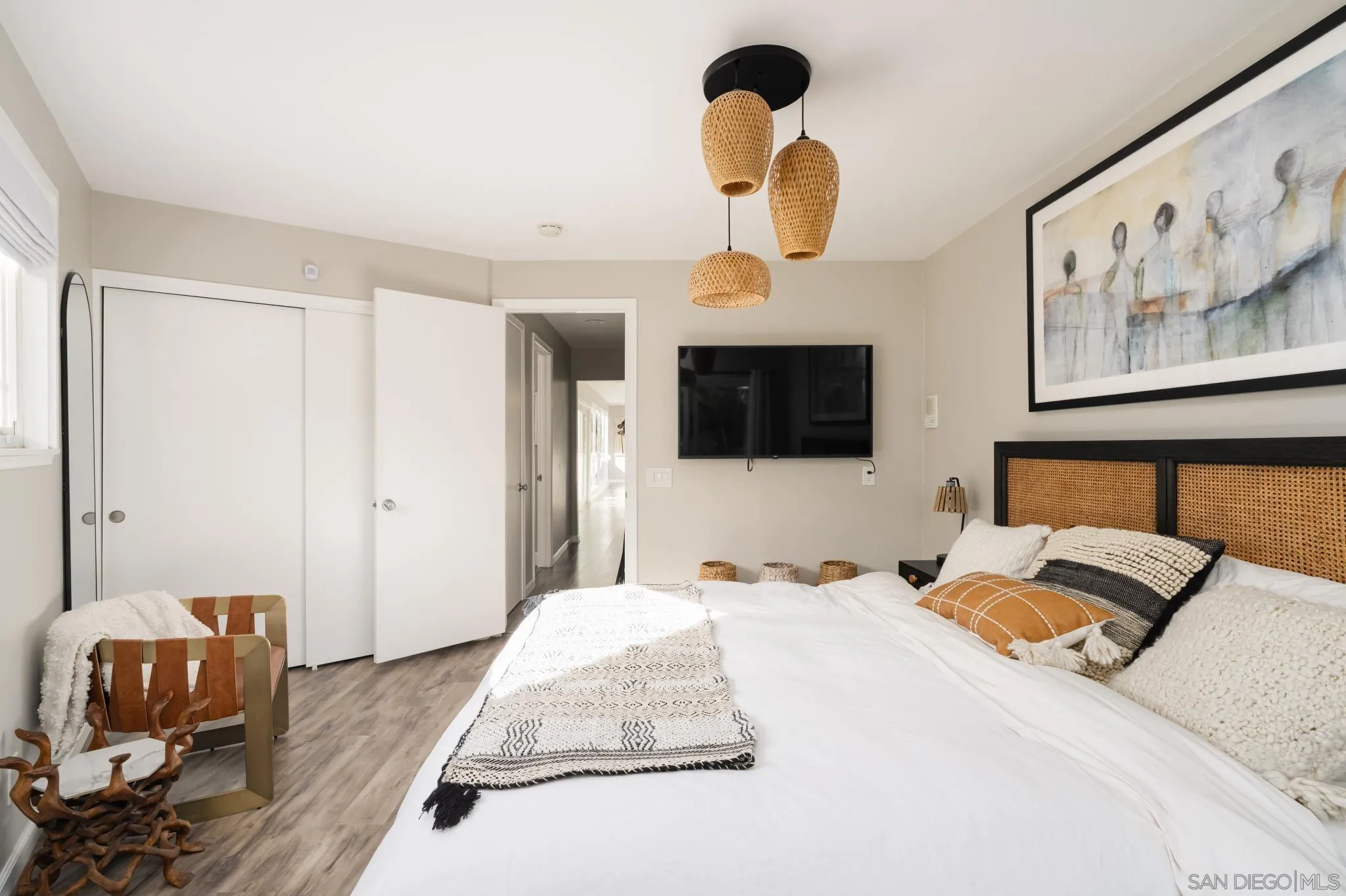 7026 Estrella De Mar Road Carlsbad, CA 92009 - Photo 35 of 46 a bedroom with a bed and a television