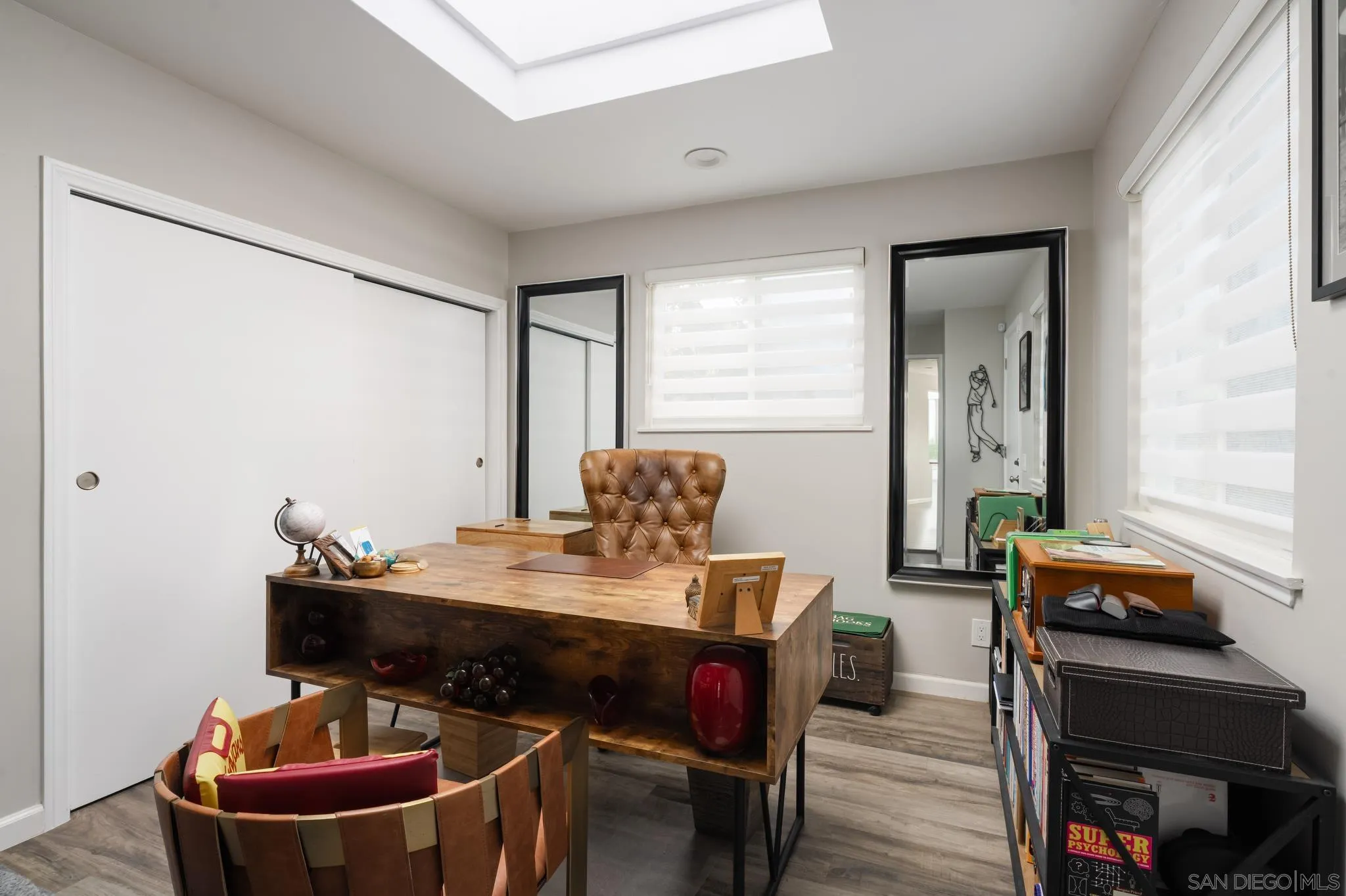 7026 Estrella De Mar Road Carlsbad, CA 92009 - Photo 37 of 46 a dining room with furniture and wooden floor