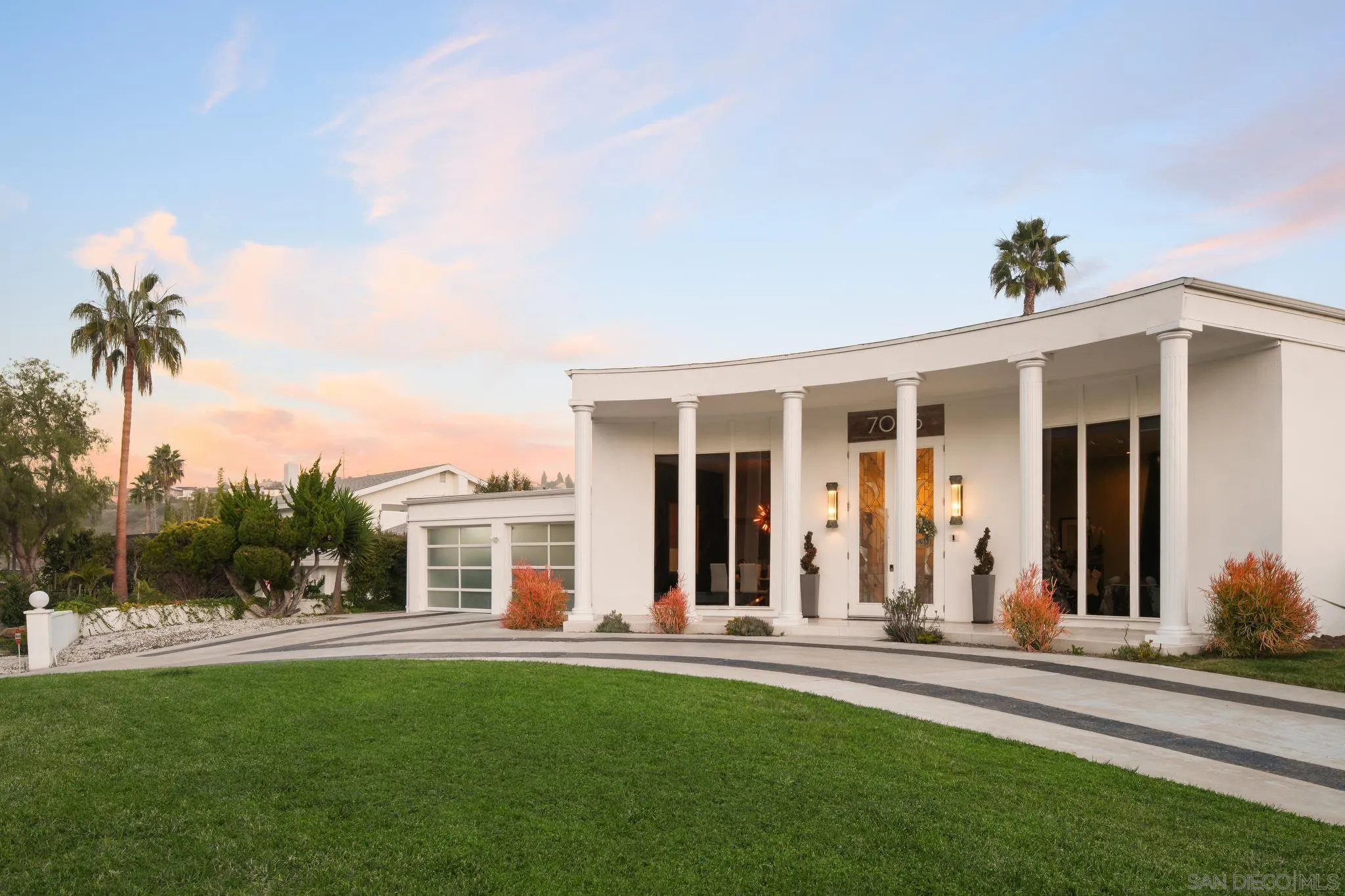 7026 Estrella De Mar Road Carlsbad, CA 92009 - Photo 44 of 46 front view of a house with a yard