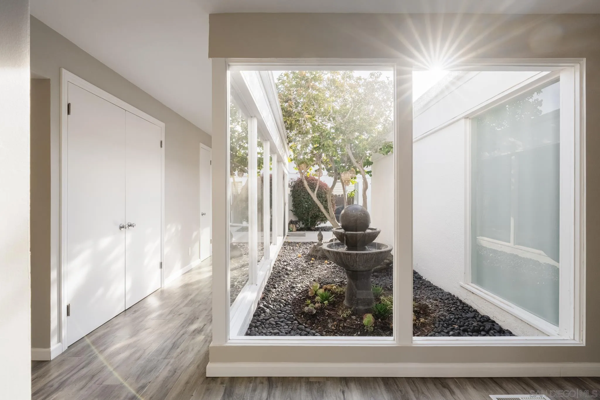 7026 Estrella De Mar Road Carlsbad, CA 92009 - Photo 7 of 46 a view of a living room from a window