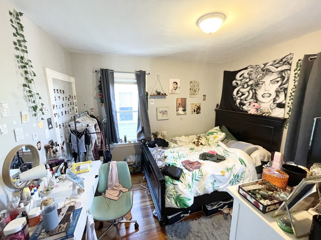 9 Taft Street, Unit 3 Boston, MA 02125 - Photo 7 of 10 a bedroom with bed and a window