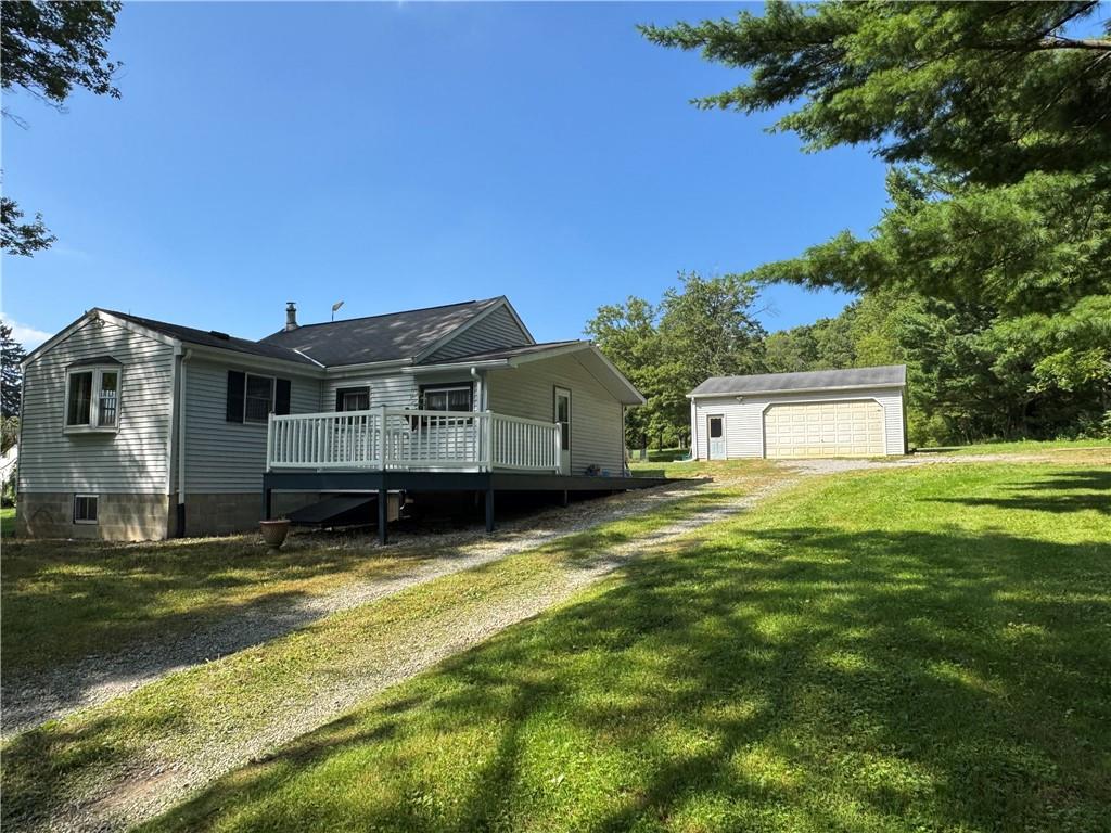 a view of a house with a big yard