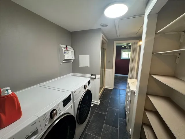 a utility room with dryer and washer