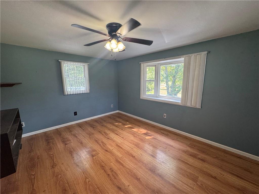 375 Browns Hill Road Valencia, PA 16059 - Photo 5 of 22 a view of an empty room with a window