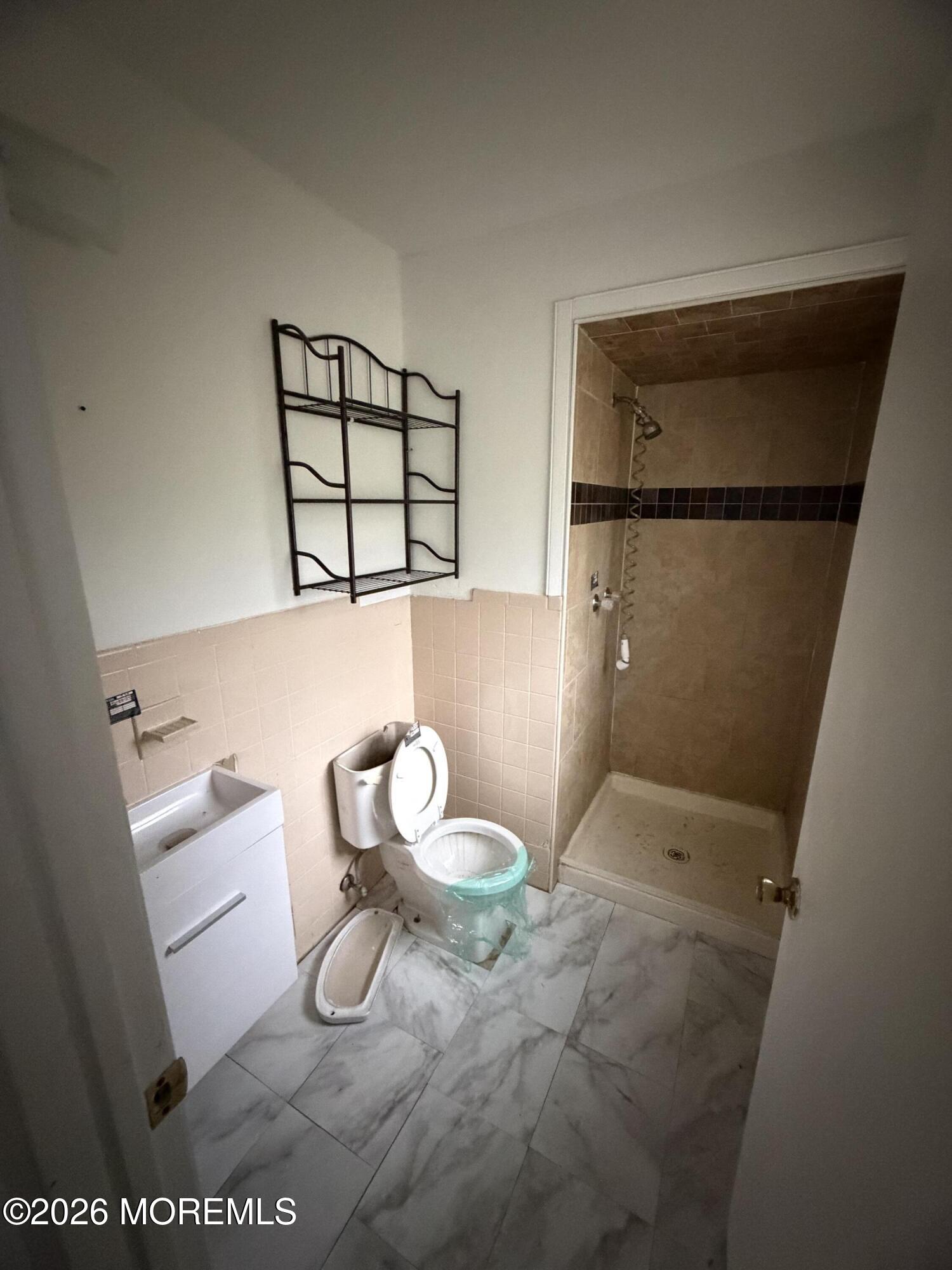 350 Bartley Road Jackson, NJ 08527 - Photo 19 of 29 a bathroom with a sink and a mirror