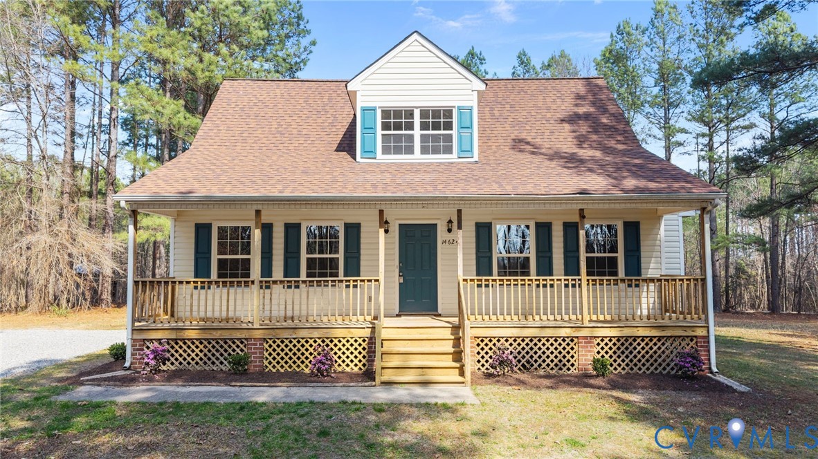 14624 Wilkinson Road Dewitt, VA 23840 - Photo 1 of 47 a front view of a house with a garden