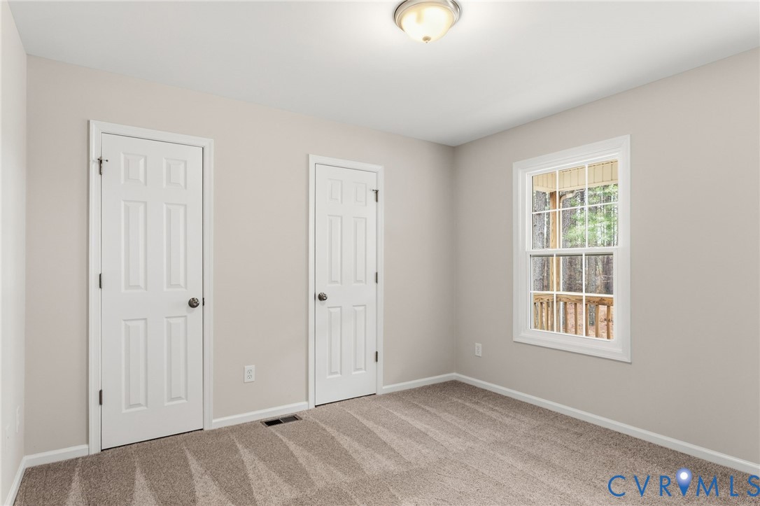 14624 Wilkinson Road Dewitt, VA 23840 - Photo 13 of 47 a view of an empty room with a window
